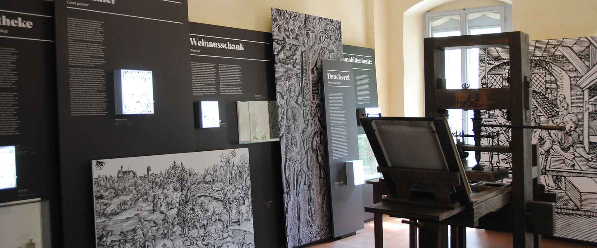 Ausstellung Cranachs Welt mit Druckerpresse